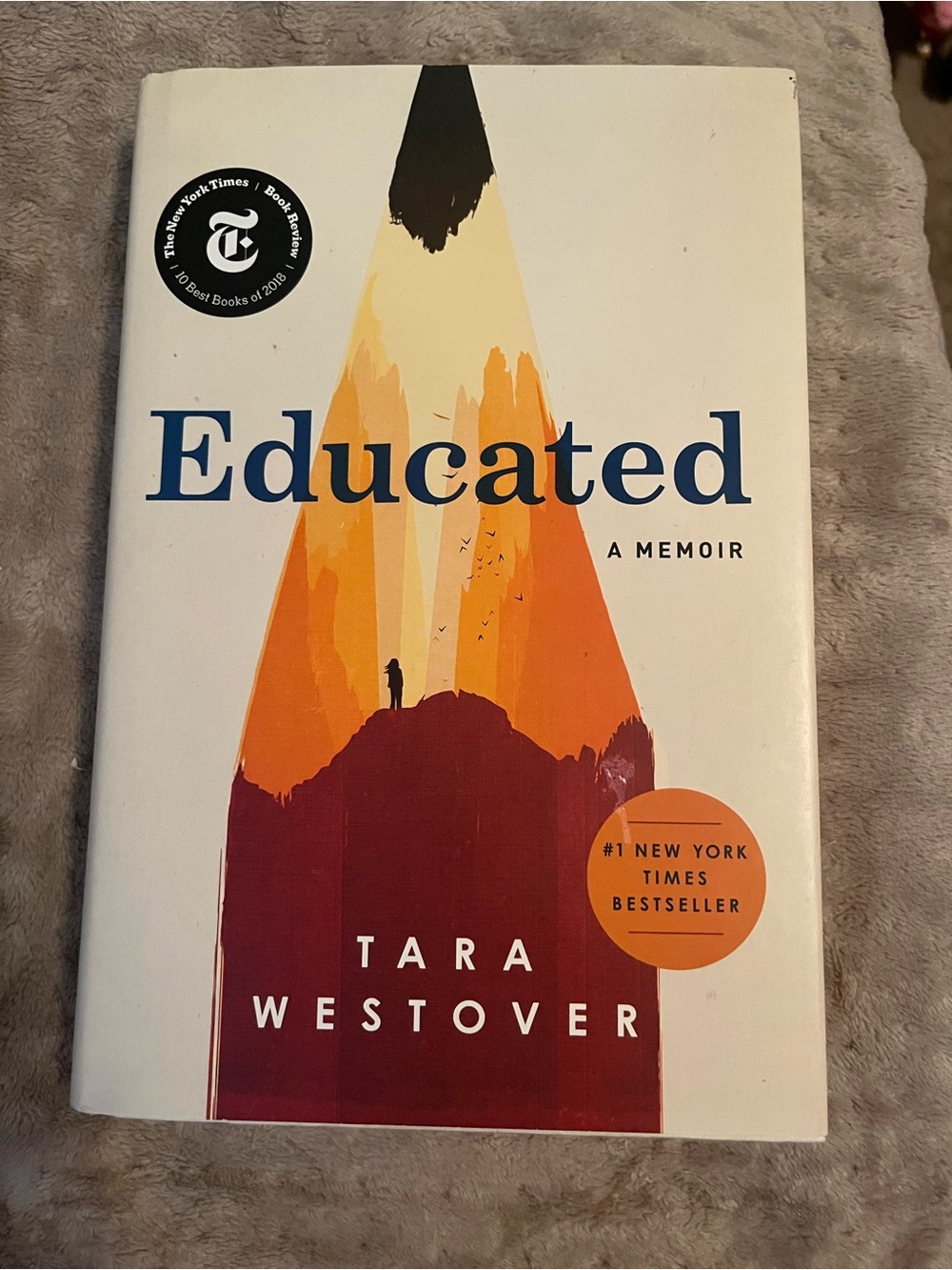 Educated by Tara Westover — White Cover with Orange & Maroon Illustration